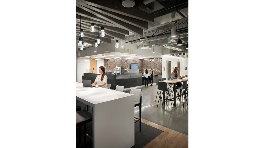 A room with a table and chairs.