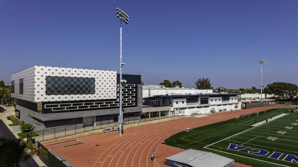 A sports stadium with a field and a track.