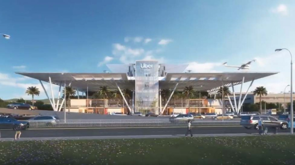 A large building with a parking lot.