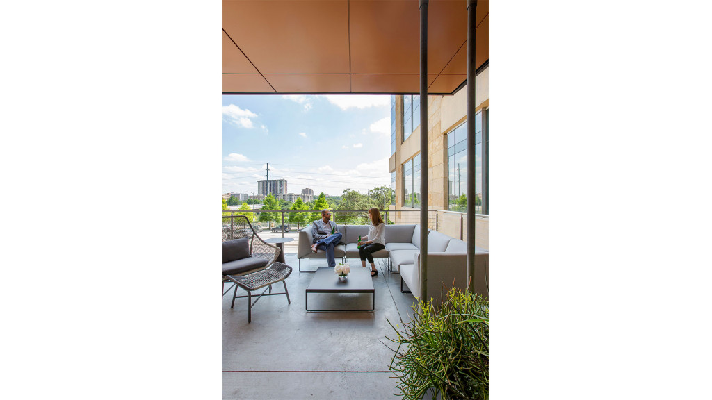 A couple sitting on a couch.