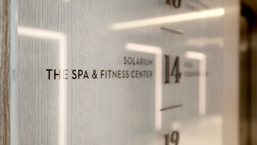 A white door with black text.