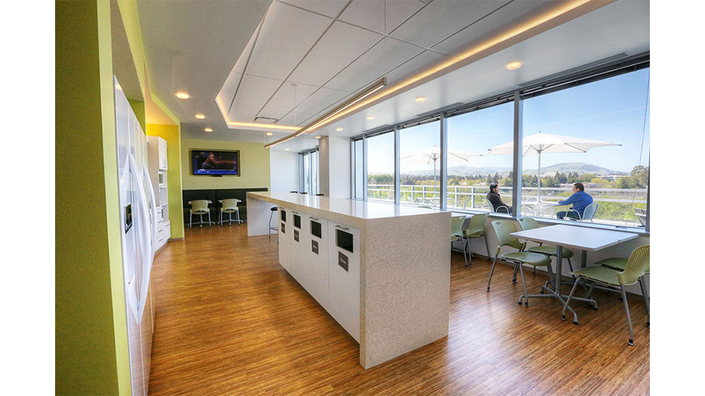 A room with a table and chairs.