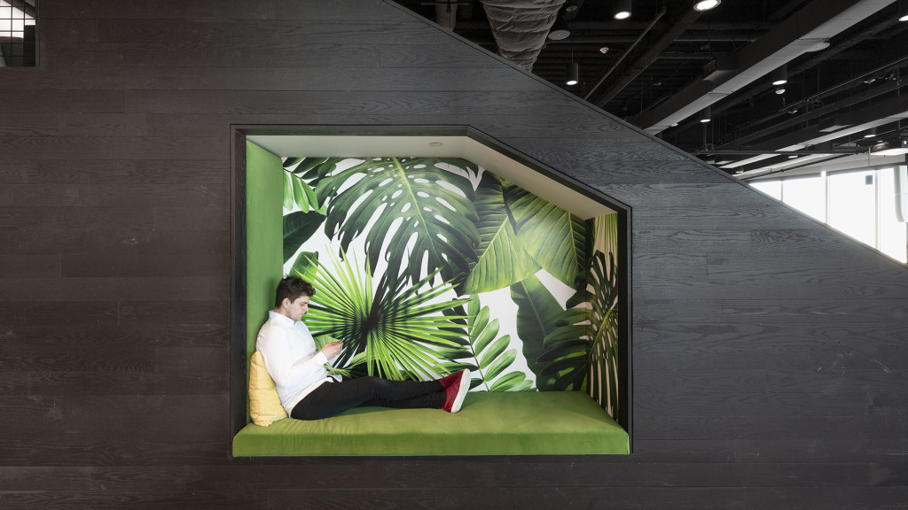 A person sitting on a couch.