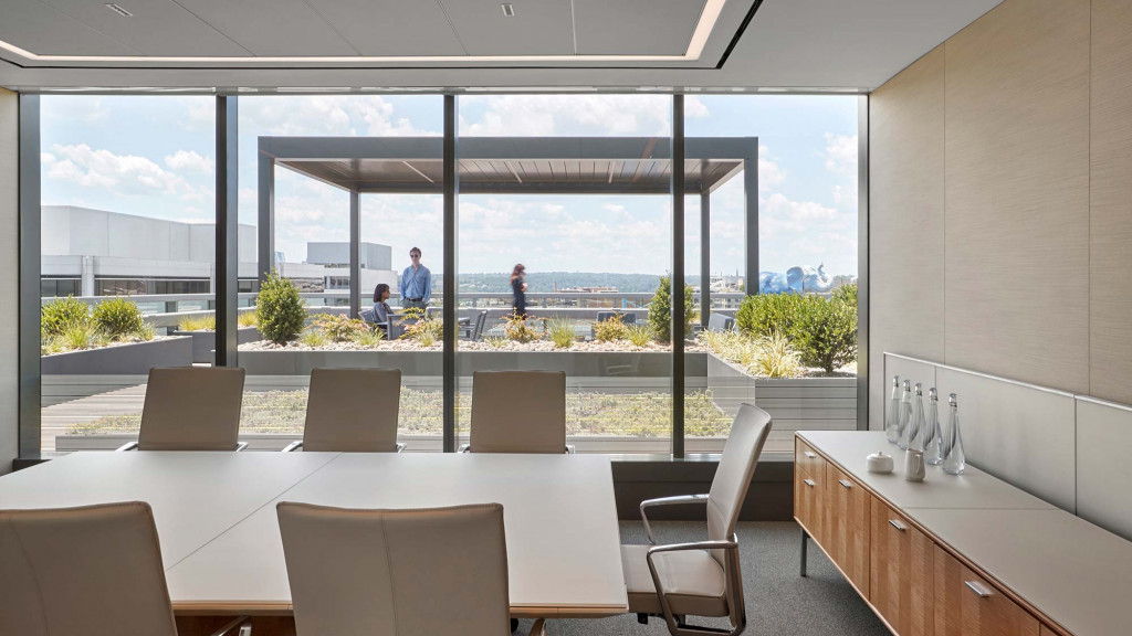 A room with a table and chairs.