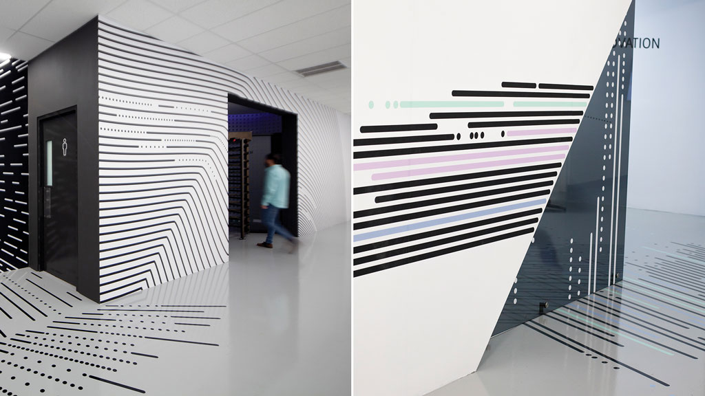 A person walking through a hallway.