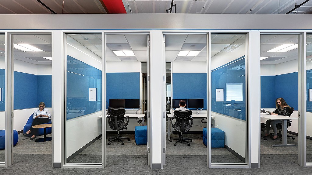 A few people sitting at a table.