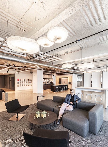 A person sitting on a couch.