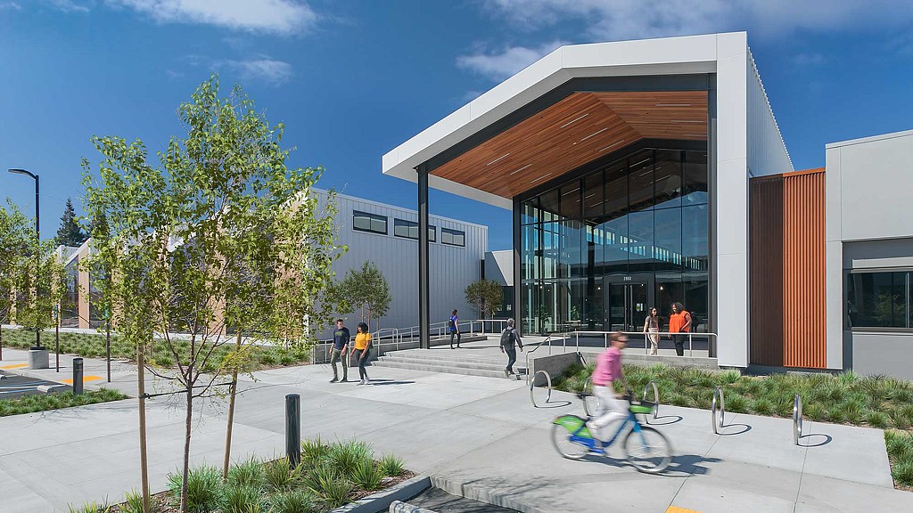 A building with people walking around.