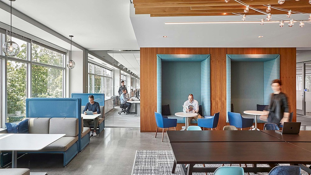 A group of people in a room.