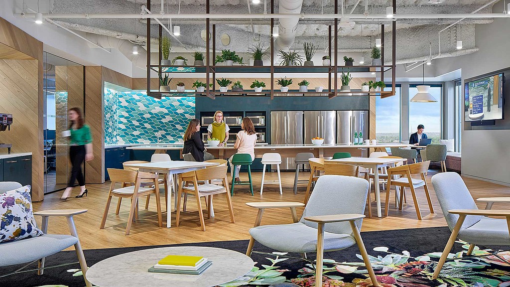 A group of people in a room.