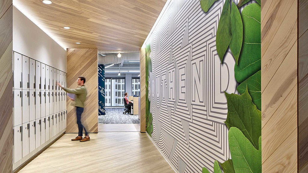 A man painting a wall.