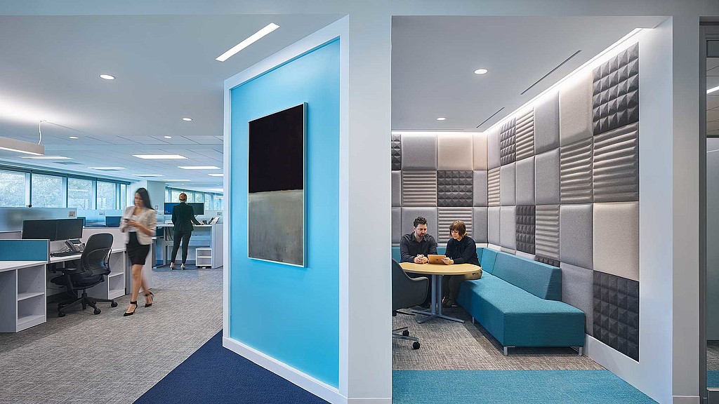 A group of people in an office.