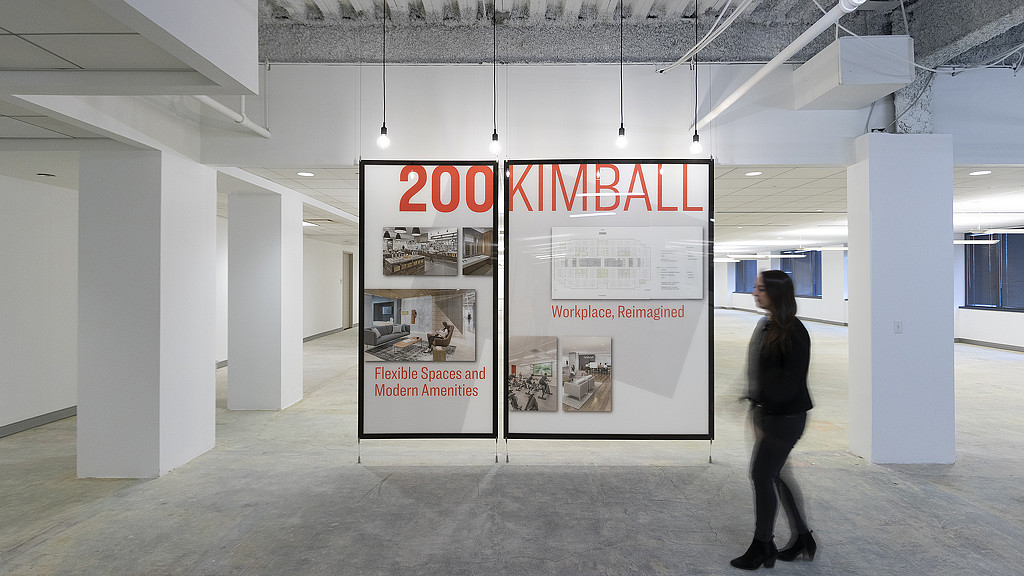 A man standing in a large building.