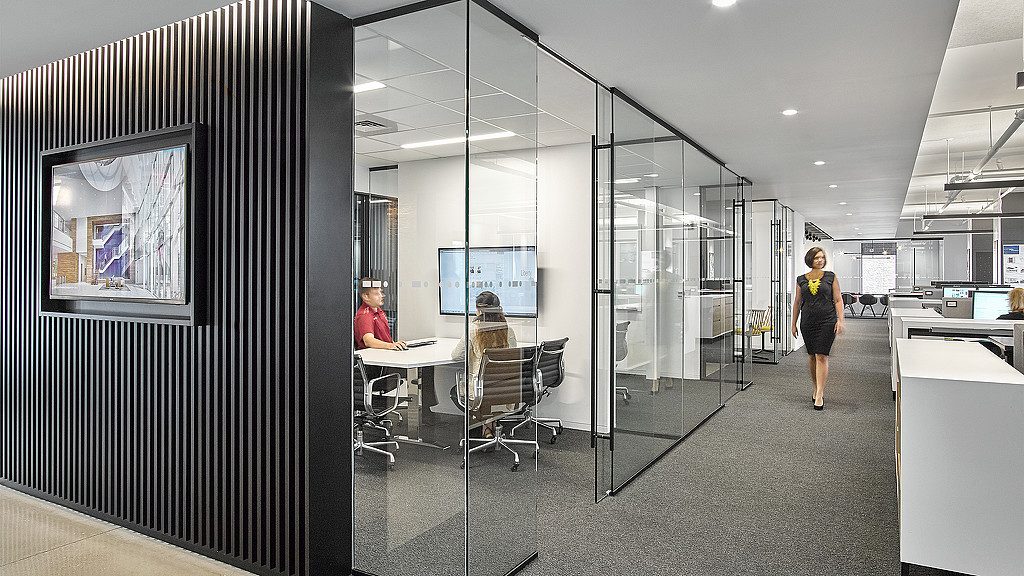 A man and woman in an office.