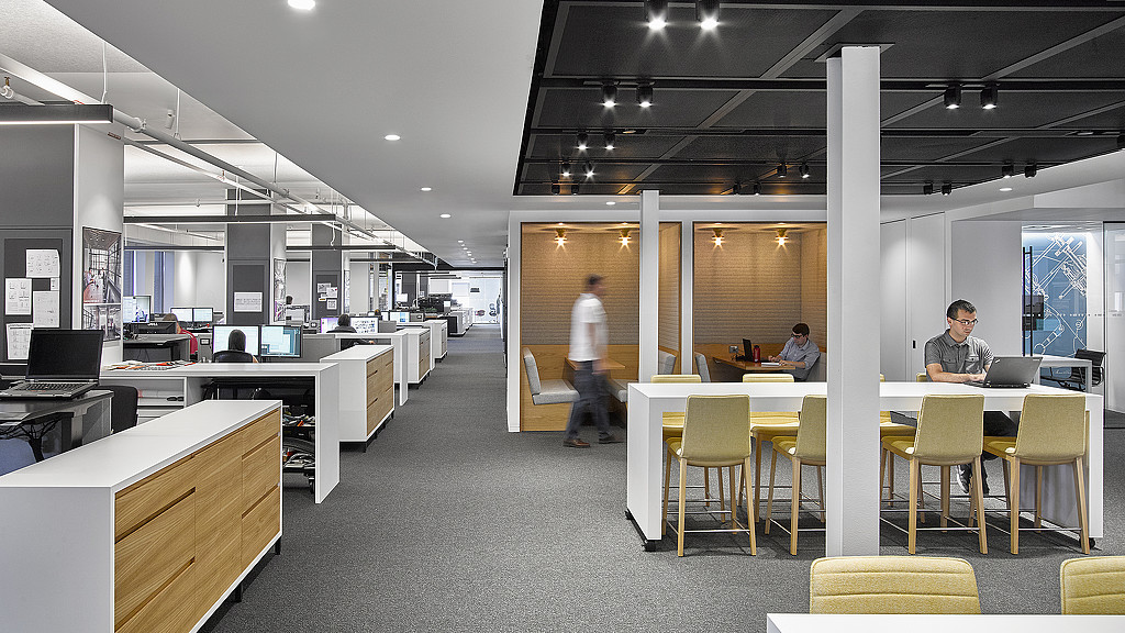 A group of people in an office.