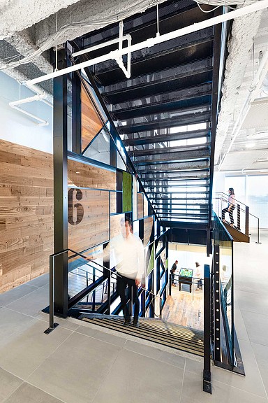 A person walking up a staircase.