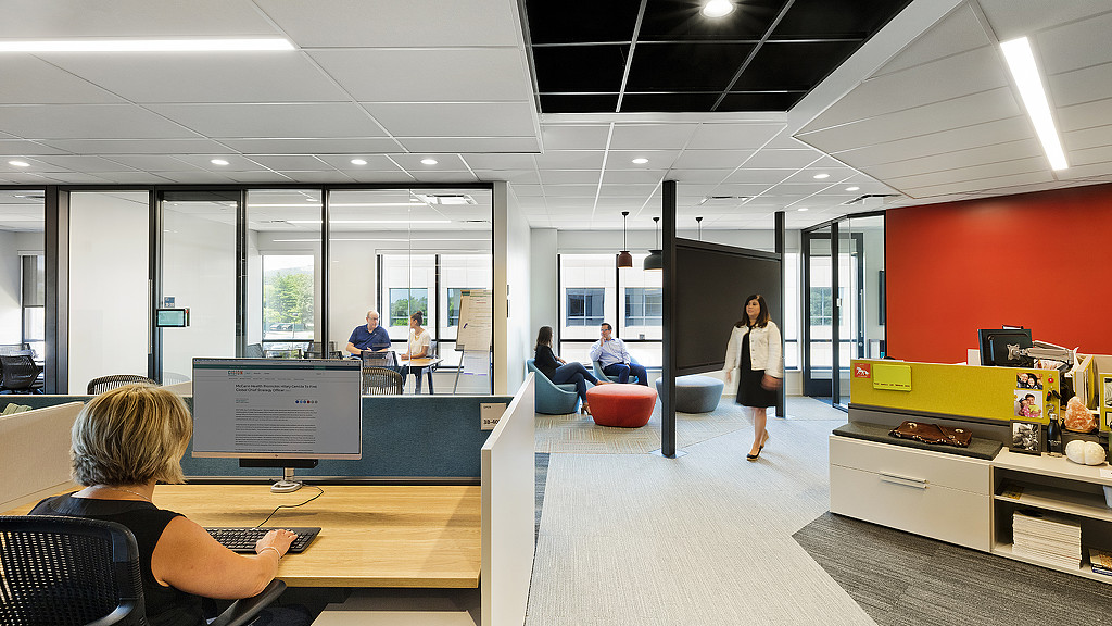 A group of people in an office.