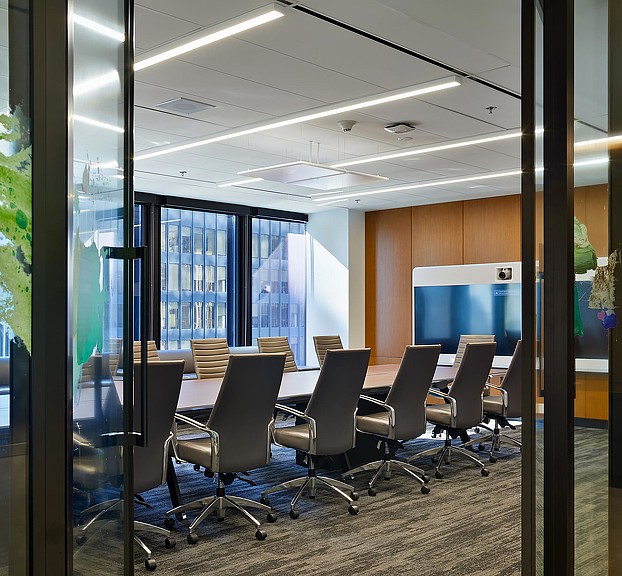 A room with chairs and a table.