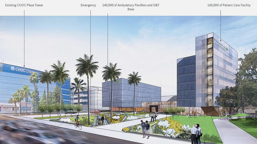 A road with trees and buildings along it.