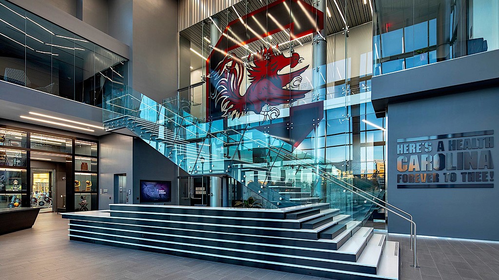A building with a large glass staircase.