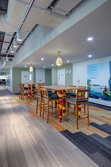 A room with tables and chairs.