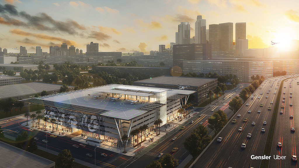 A large building with a parking lot in front of it.