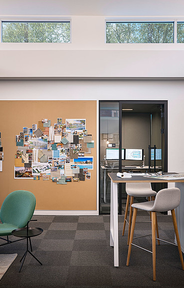 A room with a table and chairs.