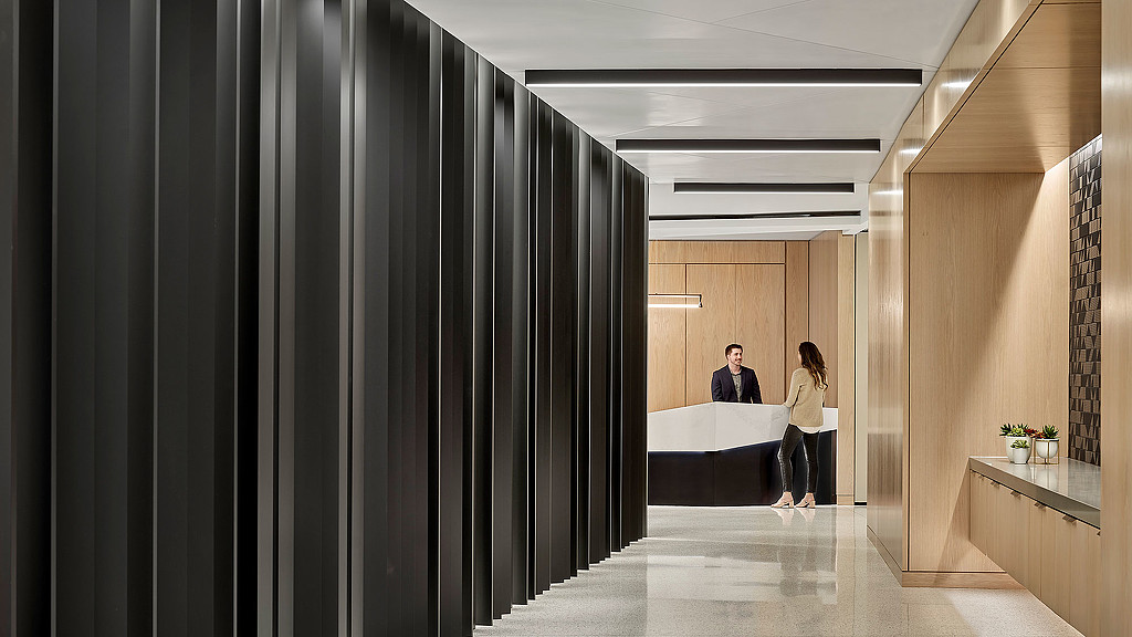 A man and woman in a room.