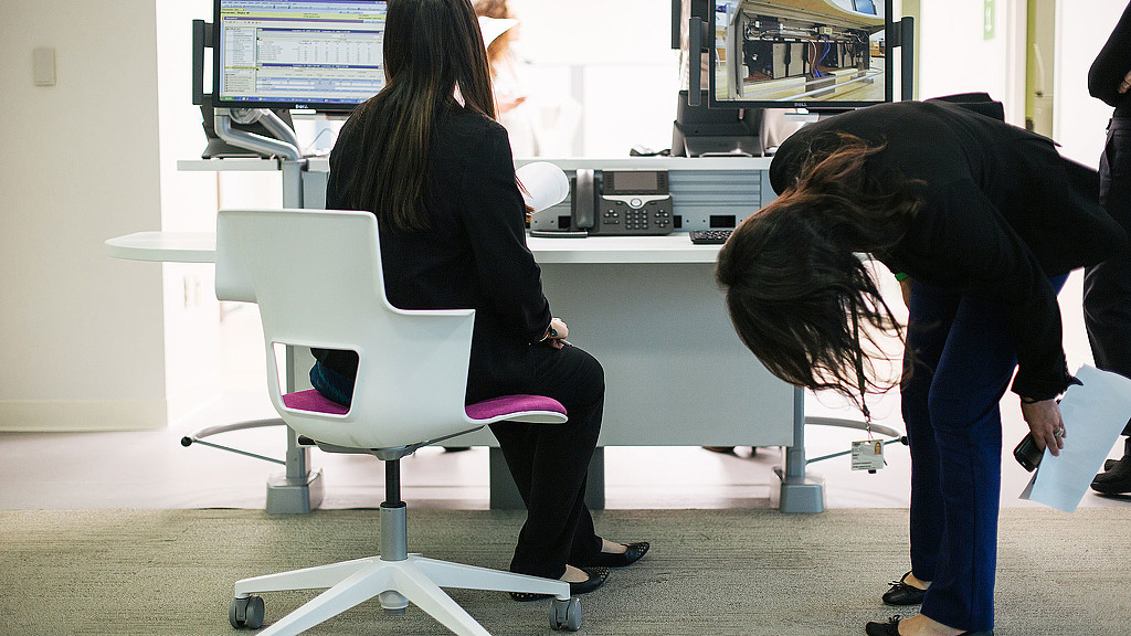 A person sitting on a chair.