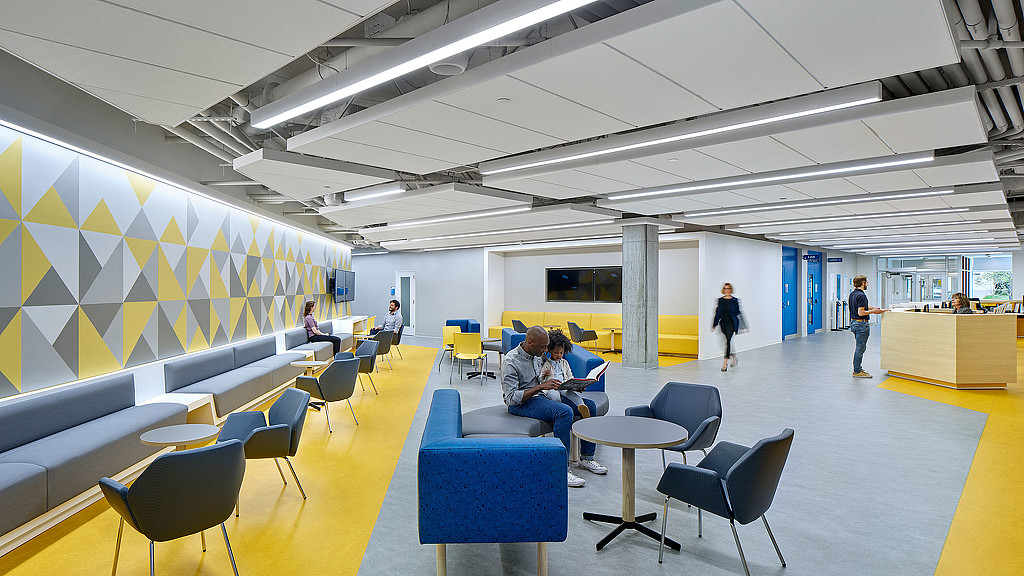 A group of people in a room.