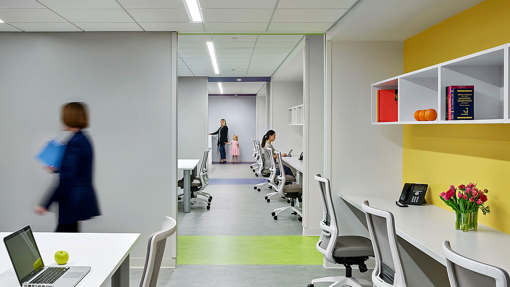 A person in a blue dress.