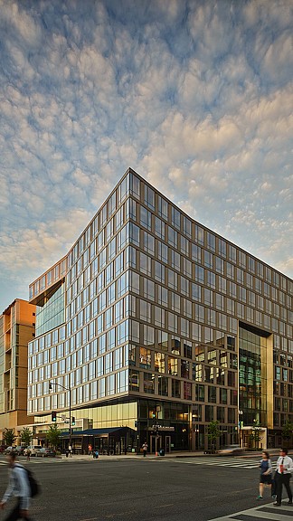 A tall building with many windows.
