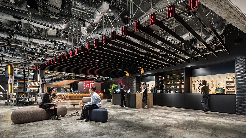 A group of people in a room.