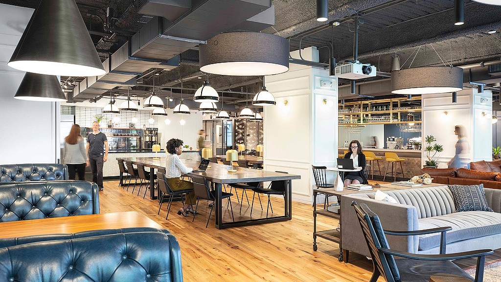 A group of people in a room.