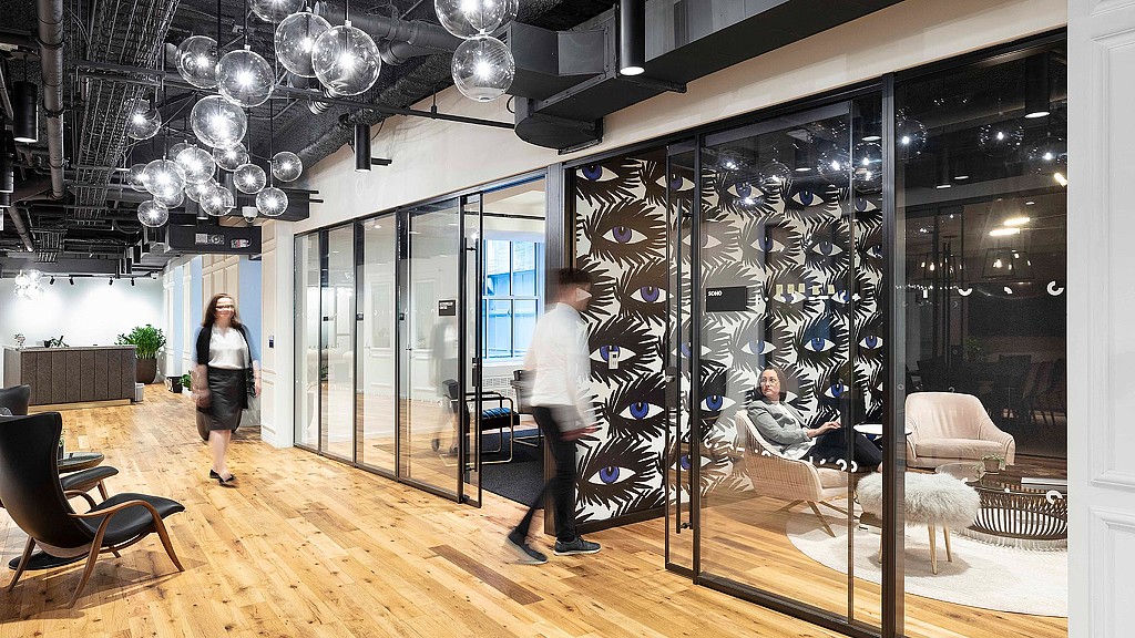 A group of people in a room.