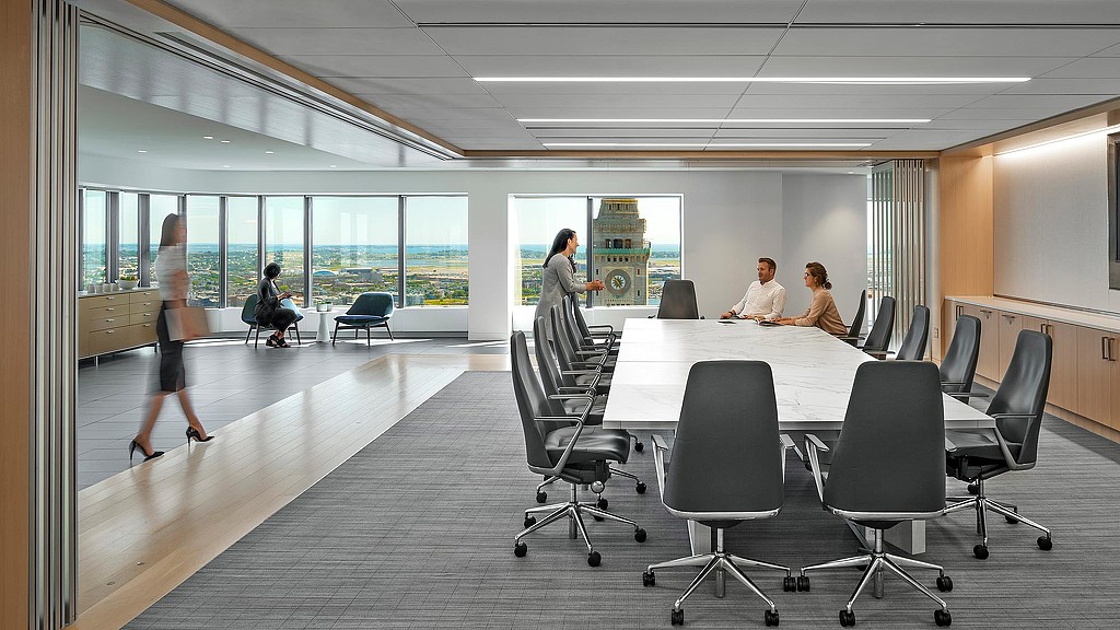 A group of people in an office.