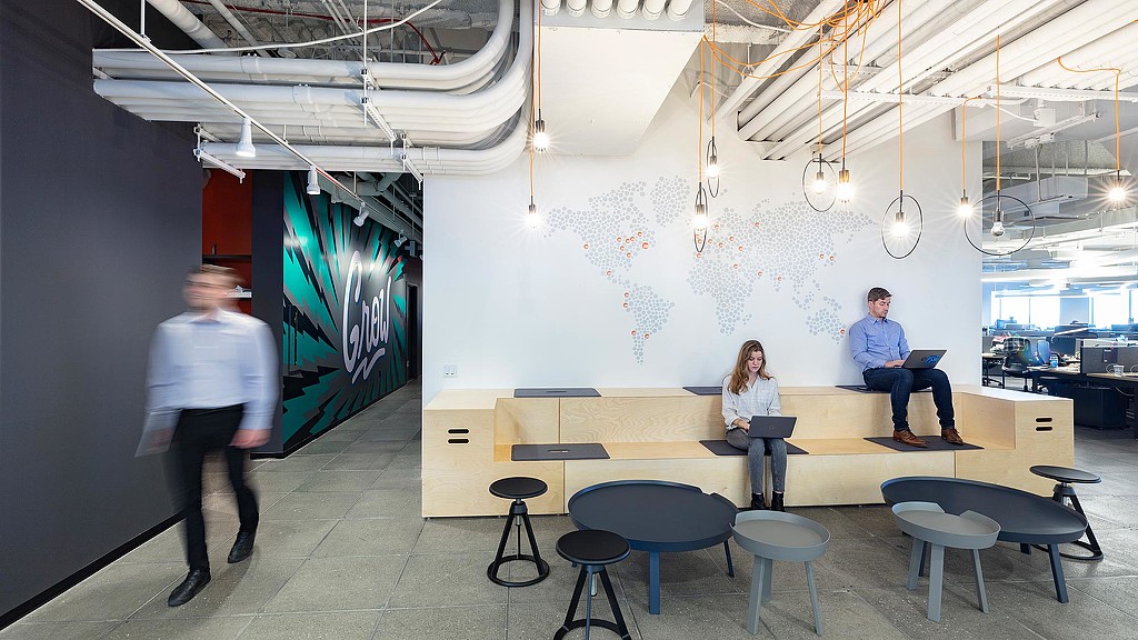 A group of people in a room.