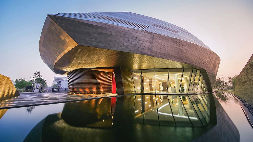 A circular building with a curved roof.