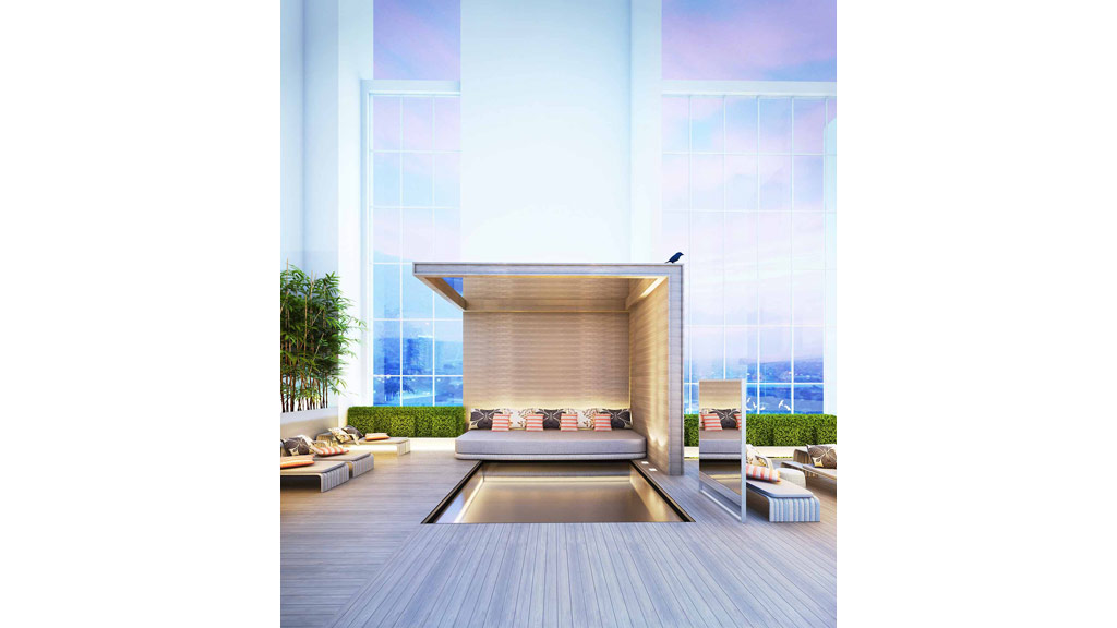 A room with a large glass wall and a large round table with a couch and a large window.