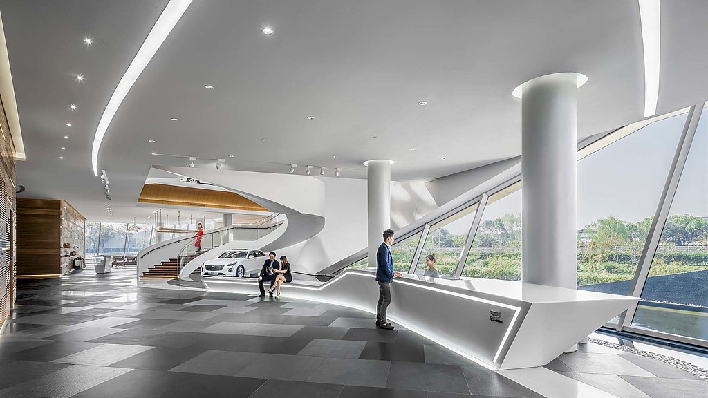 A man and a woman in a large building.