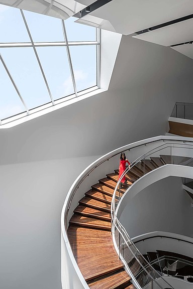 A person walking up a flight of stairs.