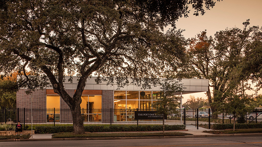 A building with trees in front of it.