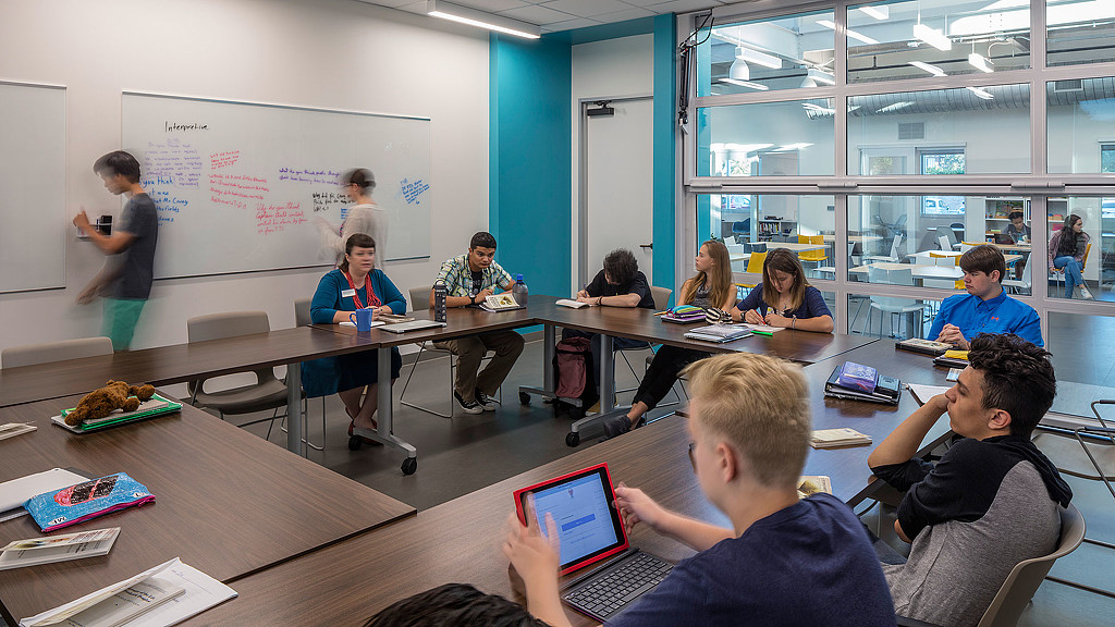 A group of people in a classroom.
