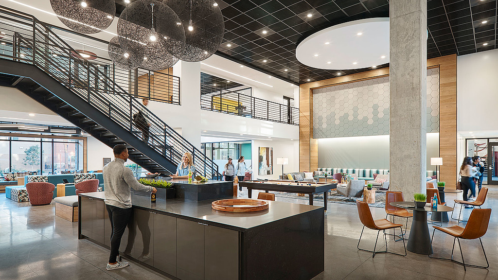 A large room with a large staircase.