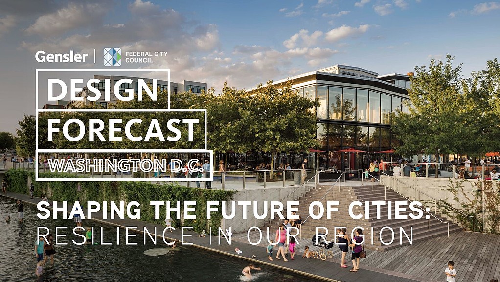 A group of people running on a path by a building.