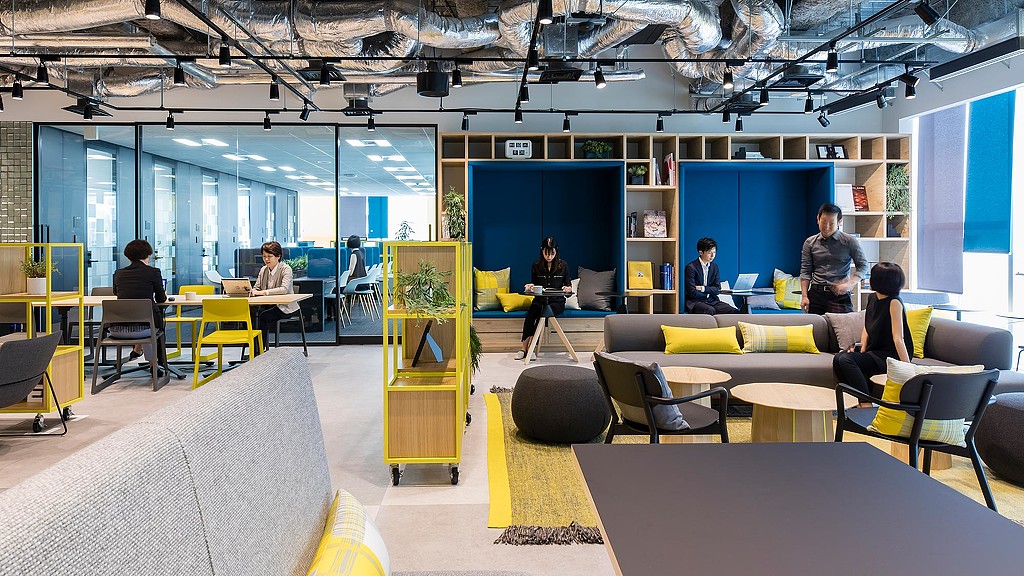 A group of people in a room.