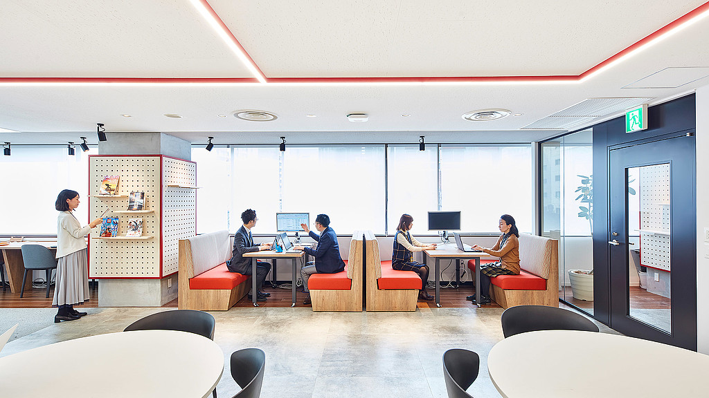 A group of people in a room.