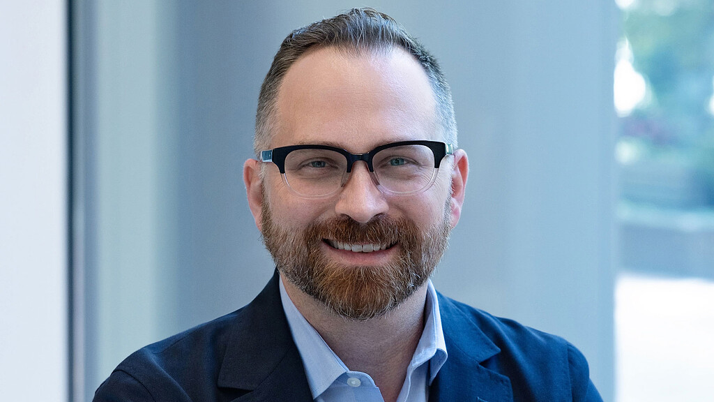 A man wearing glasses.