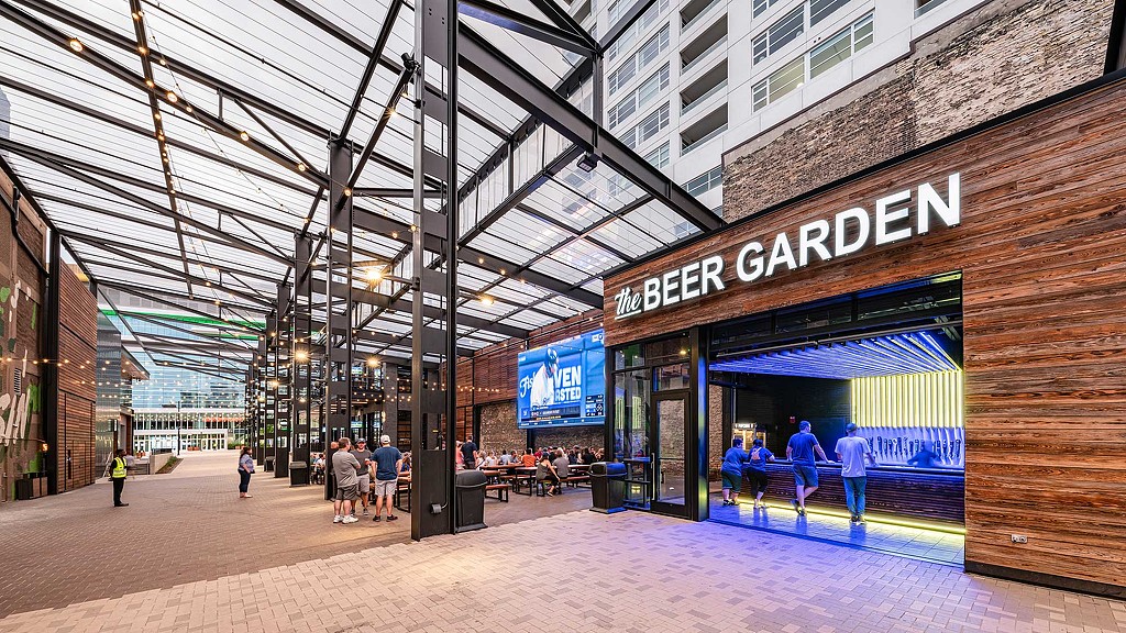 A group of people outside a building.