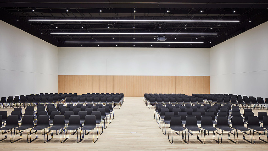 A room with rows of chairs.